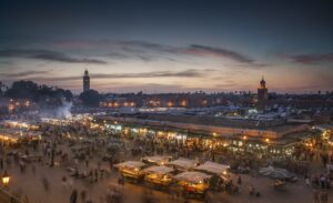 Jemaa el-Fnaa Square illuminated at dusk, Marrakesh, Morocco